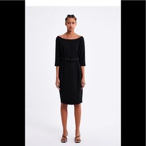 Off shoulder black belted dress